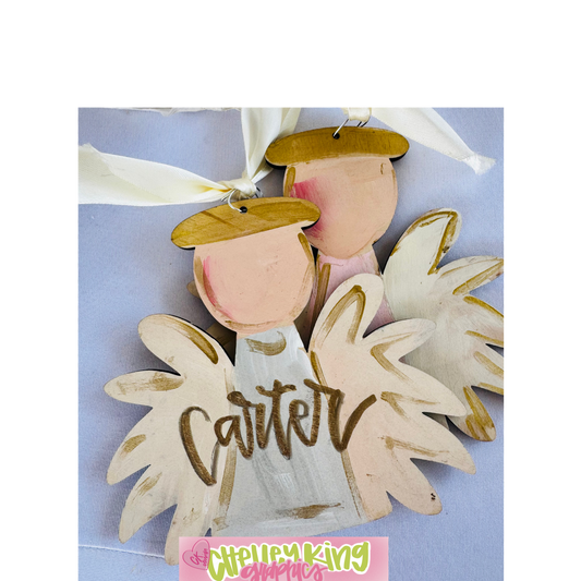 Hand painted and lettered personalized art- Angel Christmas Ornament

Approximately 6" ...

Just let us know what you would like it to say, the color bow, and the color writing!:)

Would you like a custom color or design?&nbsp; Please reach out to me at chelley@chelleyking.com!