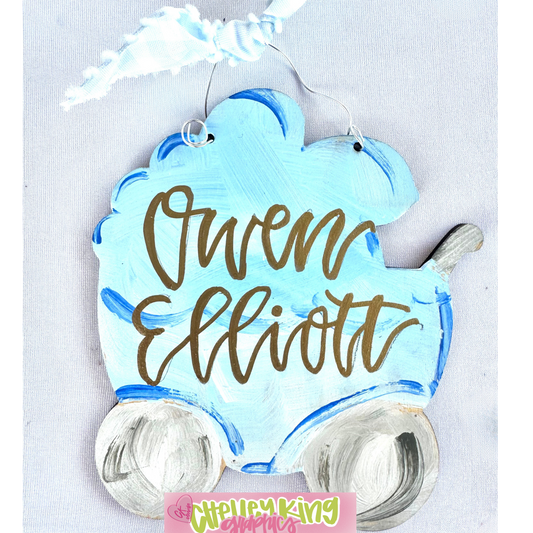 Hand painted and lettered personalized art ornament- Baby Carriage, baby's first Christmas Approximately 6" ...

Just let us know what you would like it to say, the color bow, and the color writing!:)

Would you like a custom color or design?&nbsp; Please reach out to me at chelley@chelleyking.com!