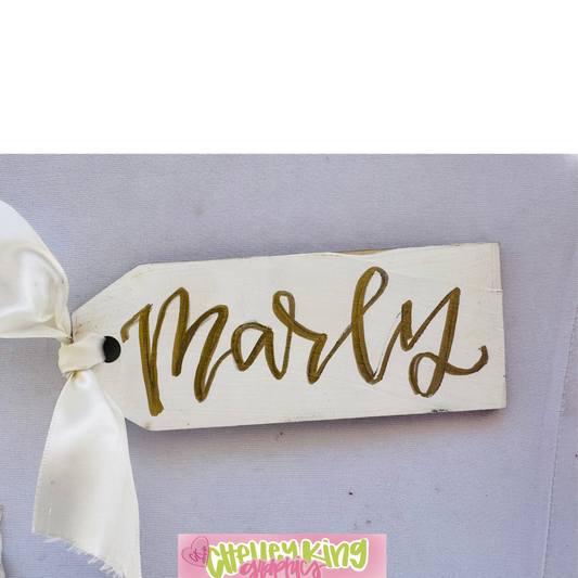 Hand painted and lettered personalized art- &nbsp;Christmas Ornament, stocking or gift tag

Approximately 6" ...

Just let us know what you would like it to say, the color bow, and the color writing!:)

Would you like a custom color or design?&nbsp; Please reach out to me at chelley@chelleyking.com!

chelleykingdesigns.com